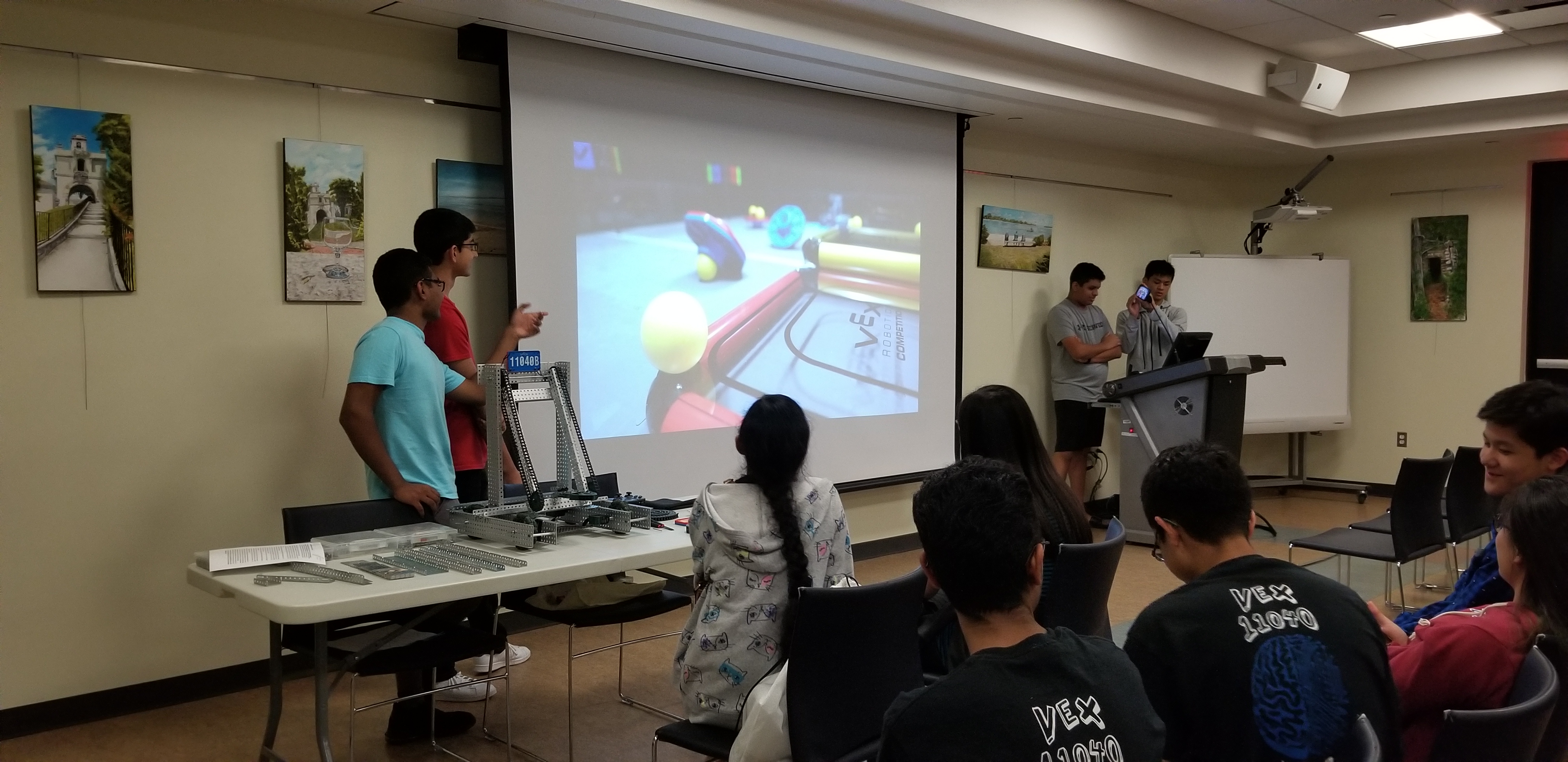 May 2018: Our club presents to middle school students at a local library to introduce robotics to them        